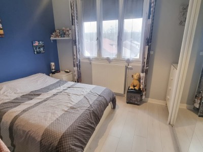 Immeuble 2 appartements F4 ,85m, 12 dpts, 10 garages lous,terrain de 2400m