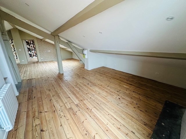 APPARTEMENT T3 - CENTRE DE ROCHE LA MOLIERE - 104.4 m2 - LOU&Eacute;