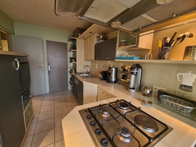 Appartement T3 avec balcons et garage - ST ETIENNE BERGSON - 81.23 m2 - 118000€